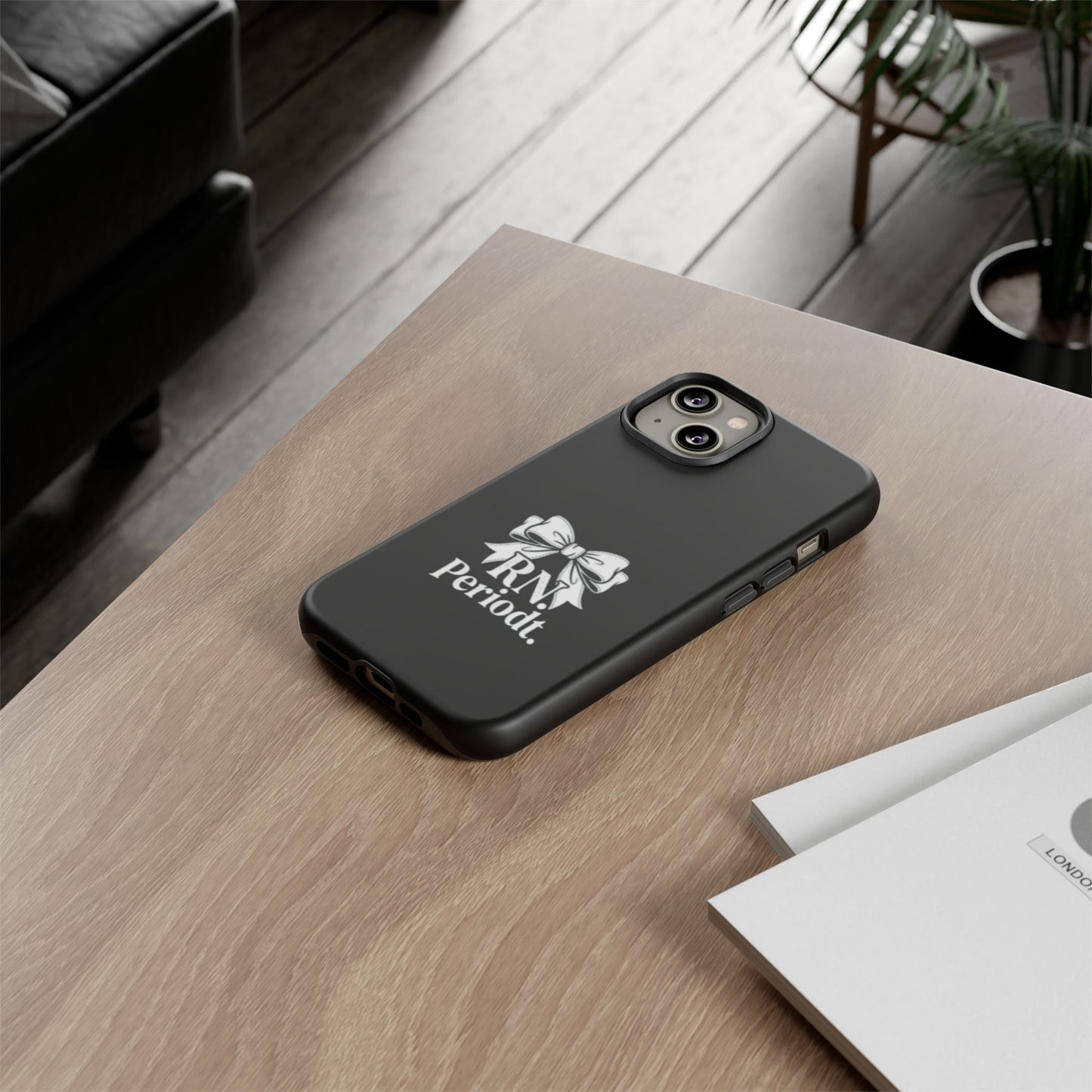 Front view of RN Phone Case with bold white bow print