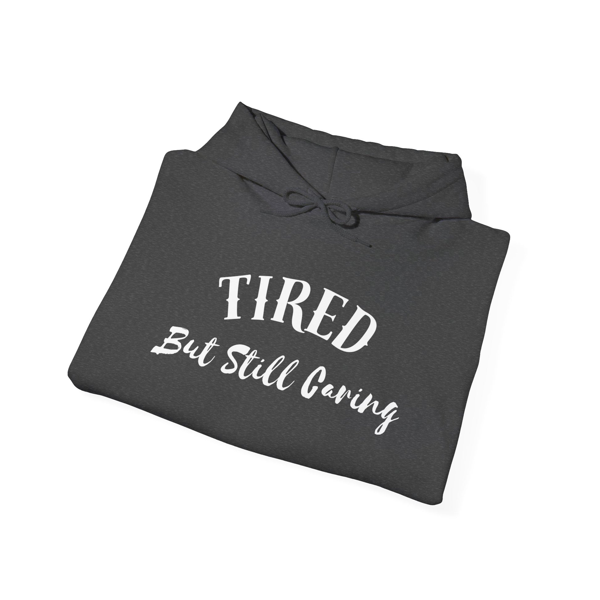 Tired But Still Caring Hoodie close-up of hand-lettered typography