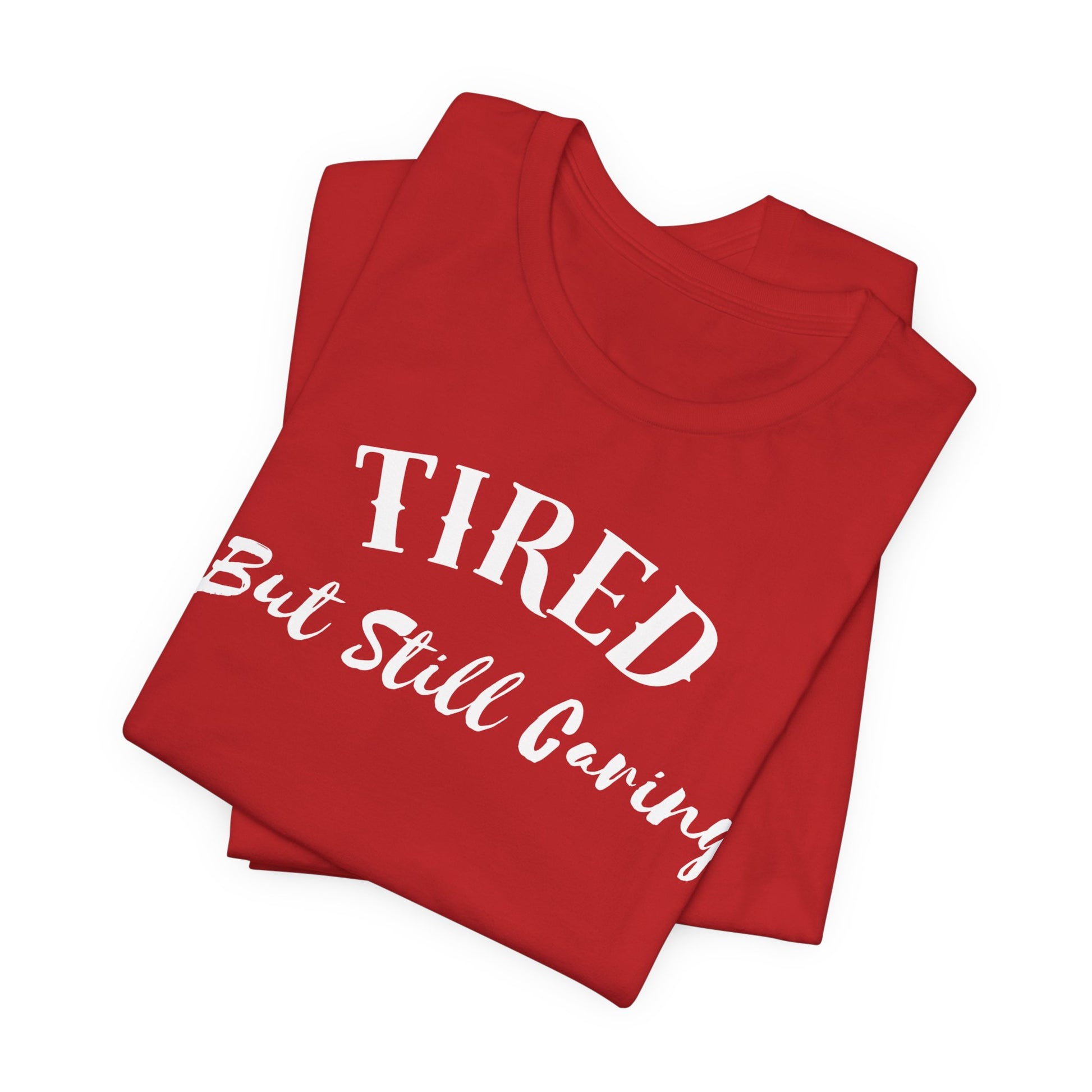 Tired But Still Caring T-Shirt with minimalist text design