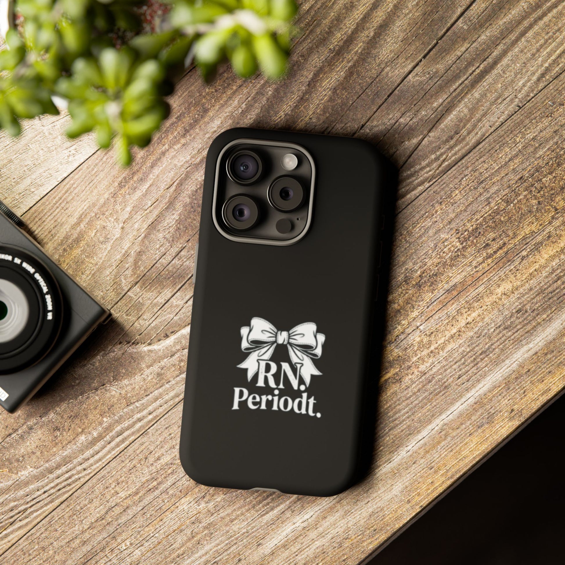Front view of RN Phone Case with bold white bow print