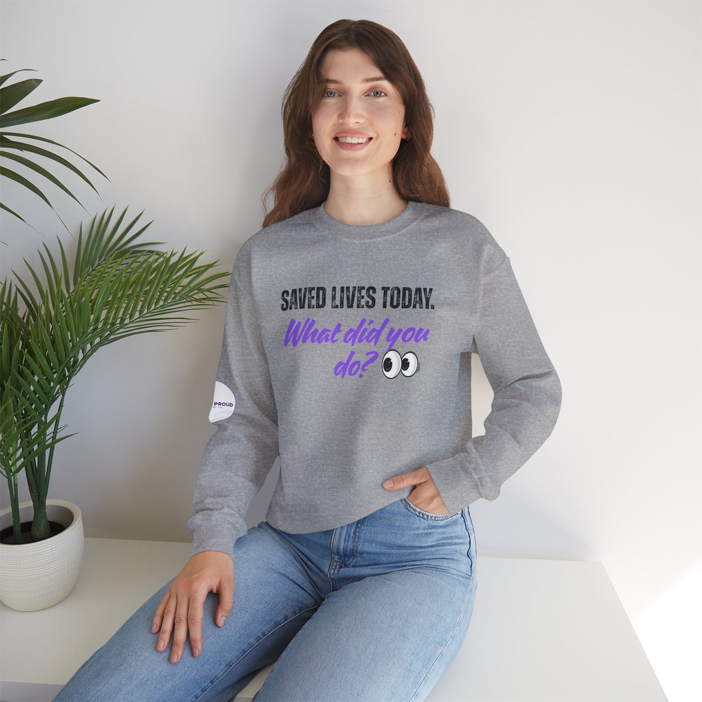Saved Lives Today Sweatshirt with purple and black lettering detail