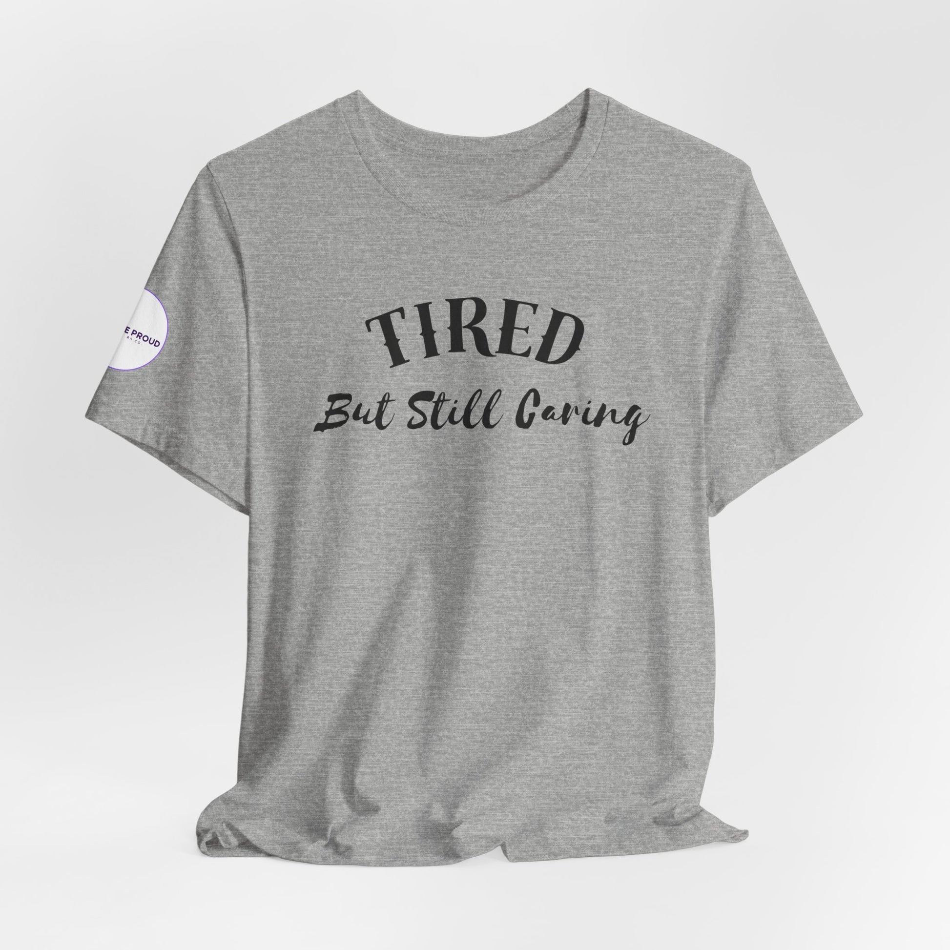 Tired But Still Caring T-Shirt with minimalist text design