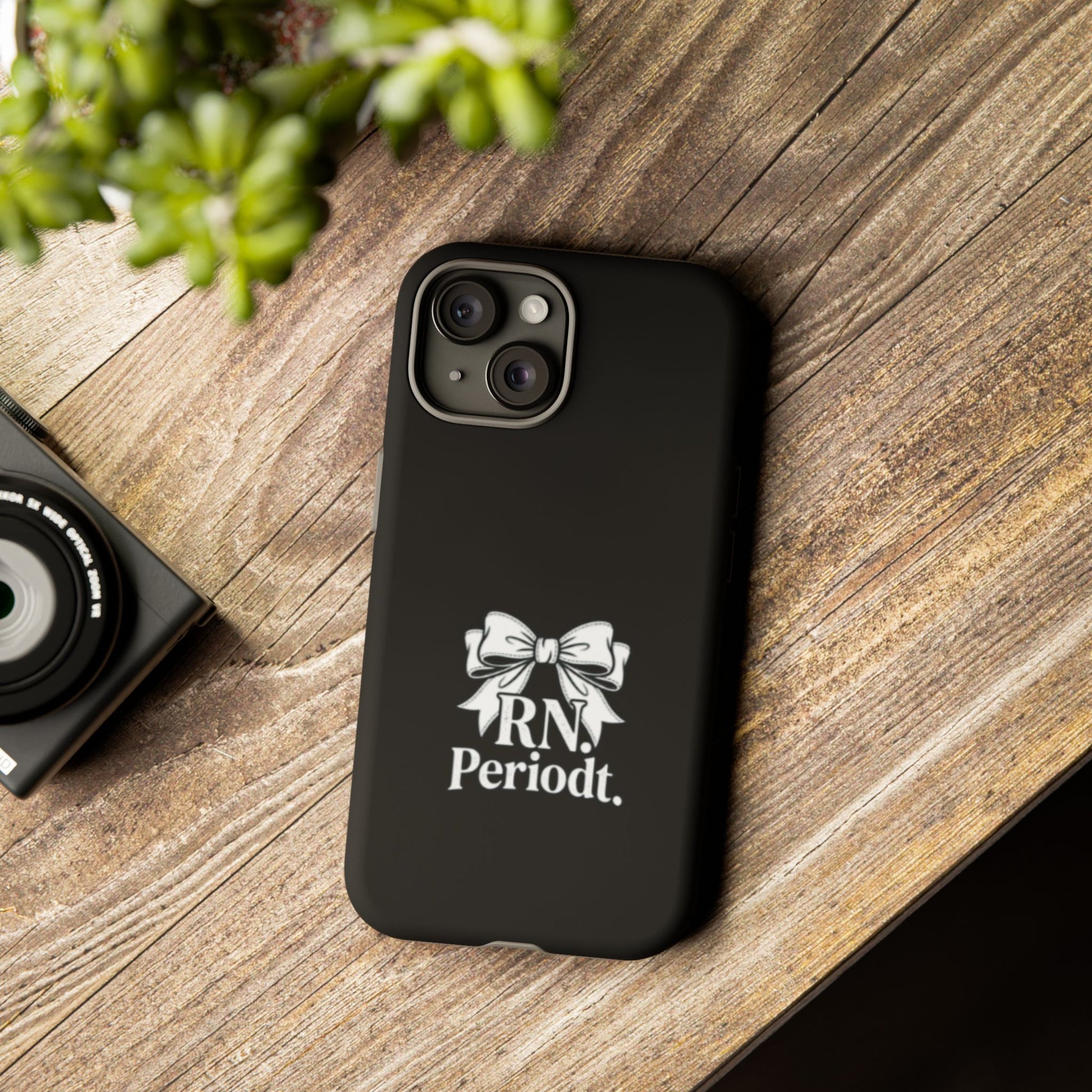 Front view of RN Phone Case with bold white bow print