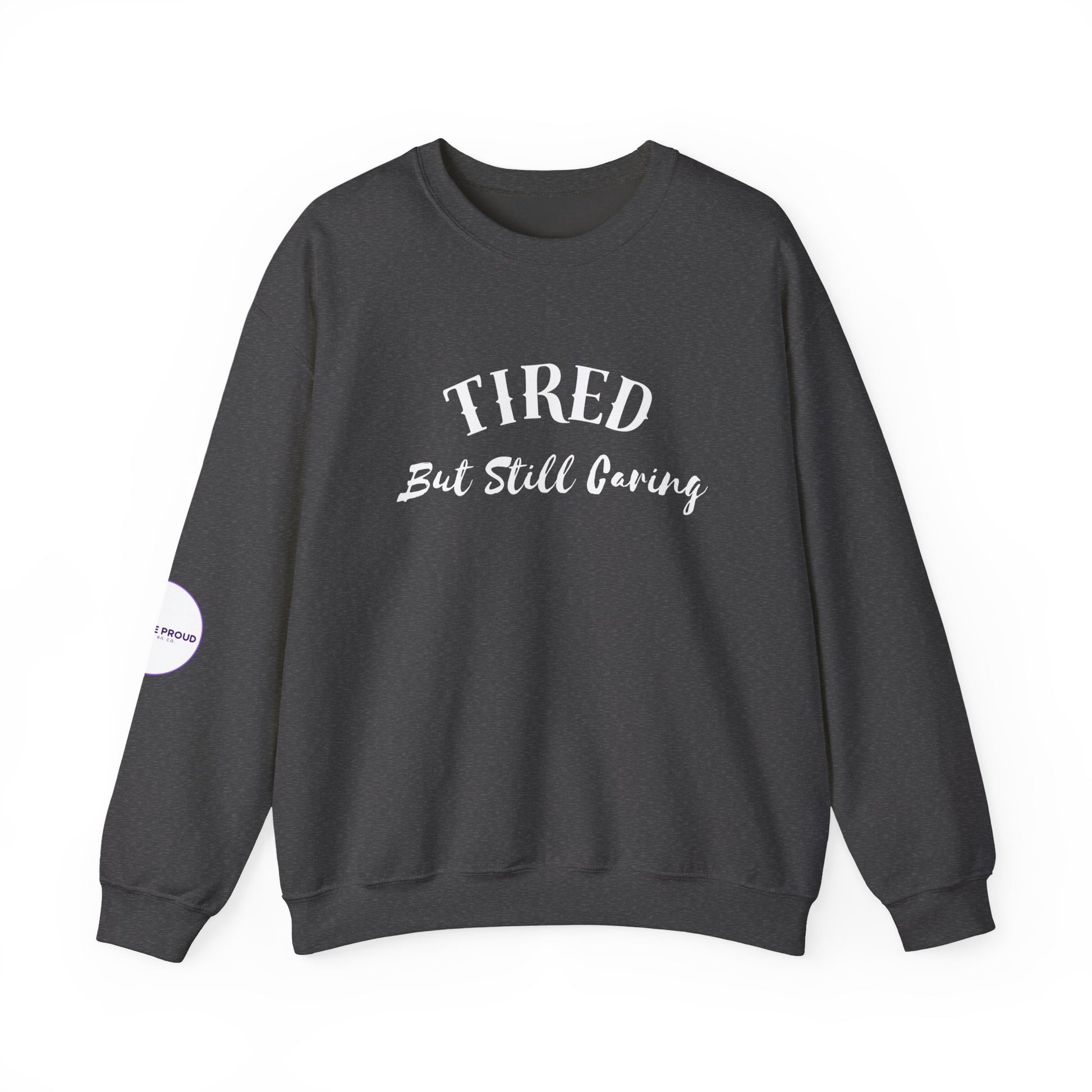 Subtle sleeve embroidery on Tired But Still Caring Sweatshirt