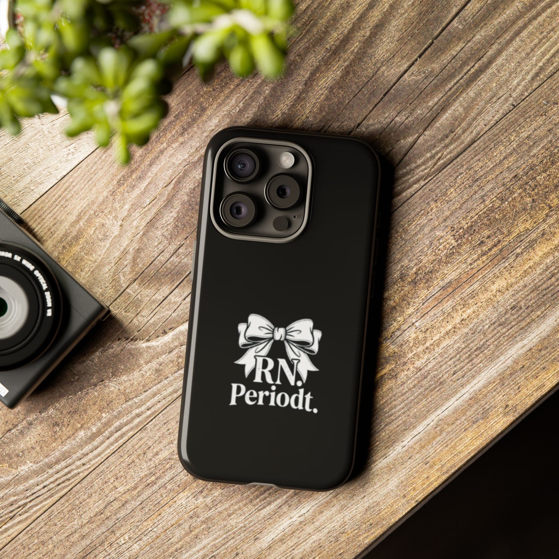 Front view of RN Phone Case with bold white bow print