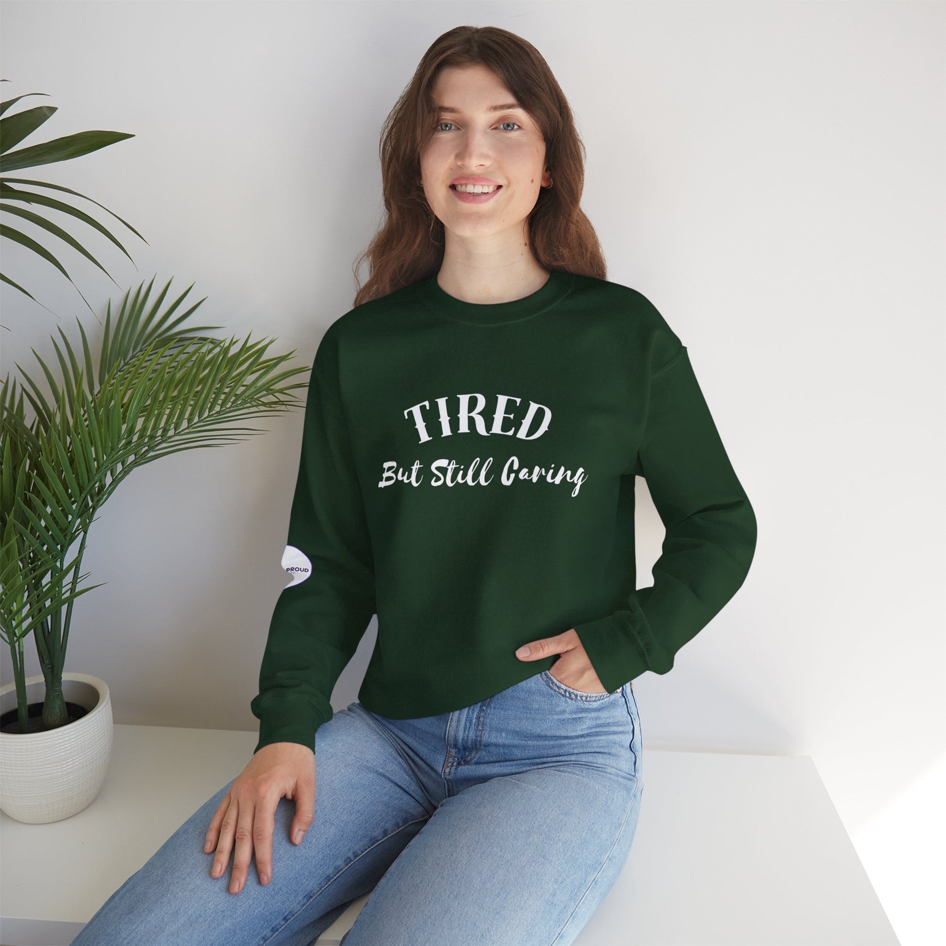 Tired But Still Caring Sweatshirt with midweight cotton-poly blend fabric