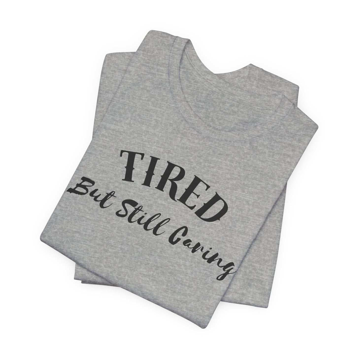 Tired But Still Caring T-Shirt with minimalist text design