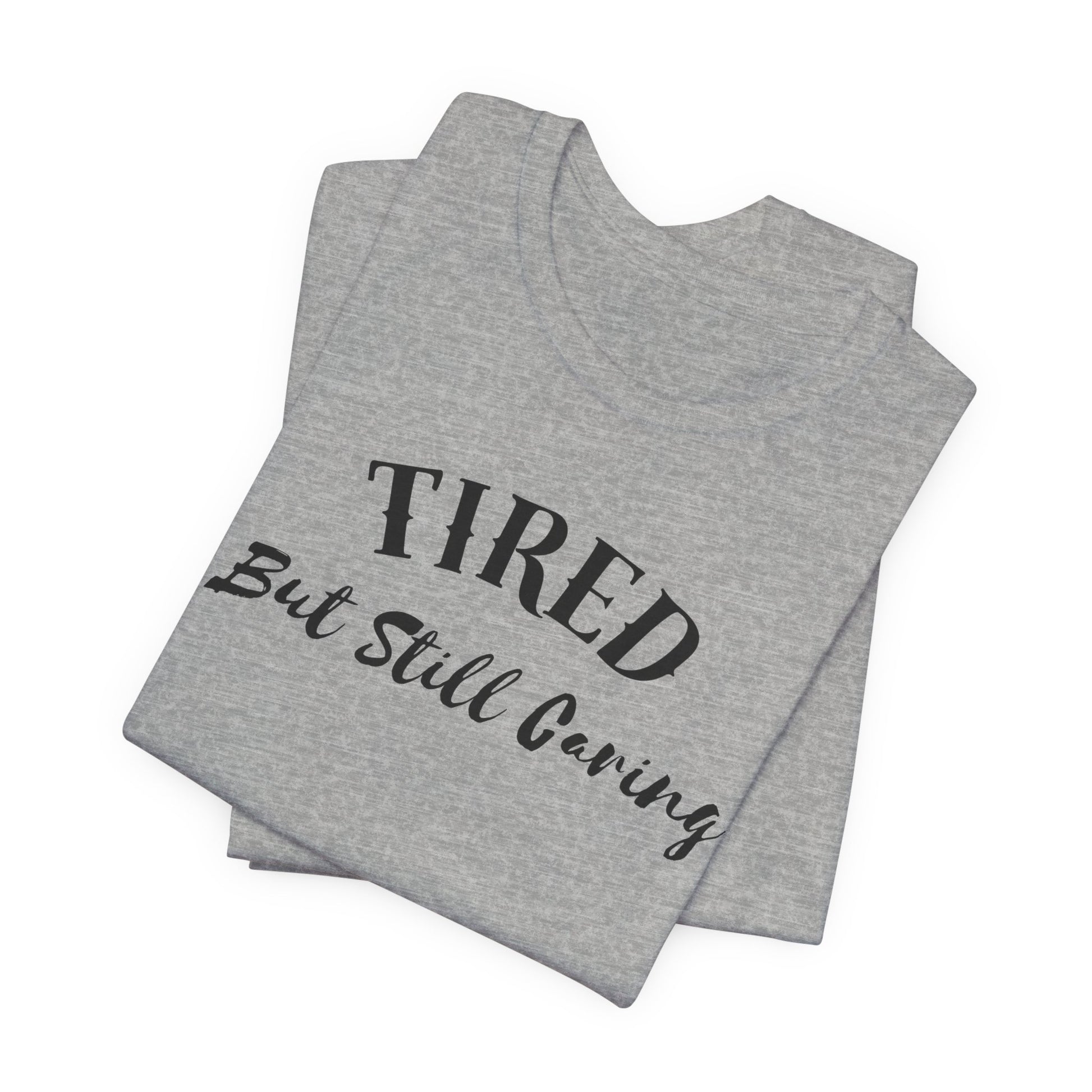Tired But Still Caring T-Shirt with minimalist text design