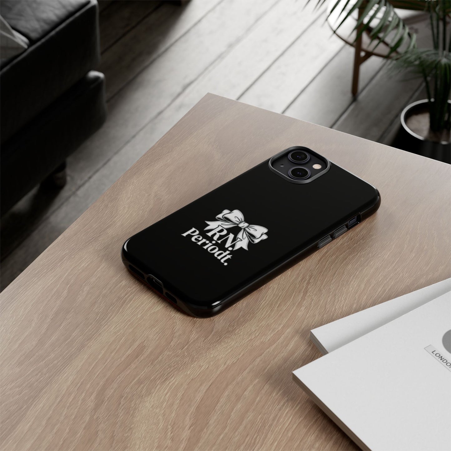 Front view of RN Phone Case with bold white bow print