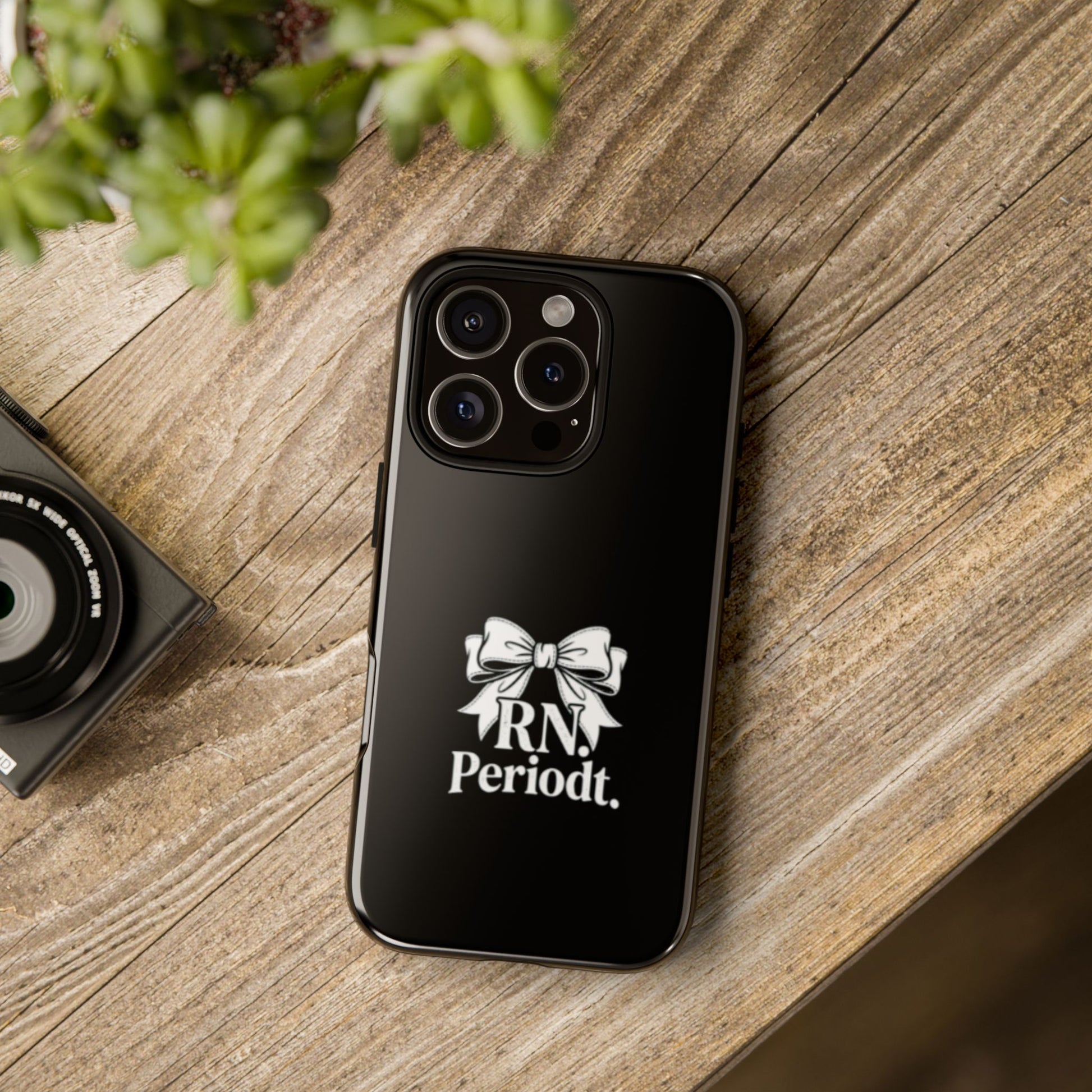 Front view of RN Phone Case with bold white bow print