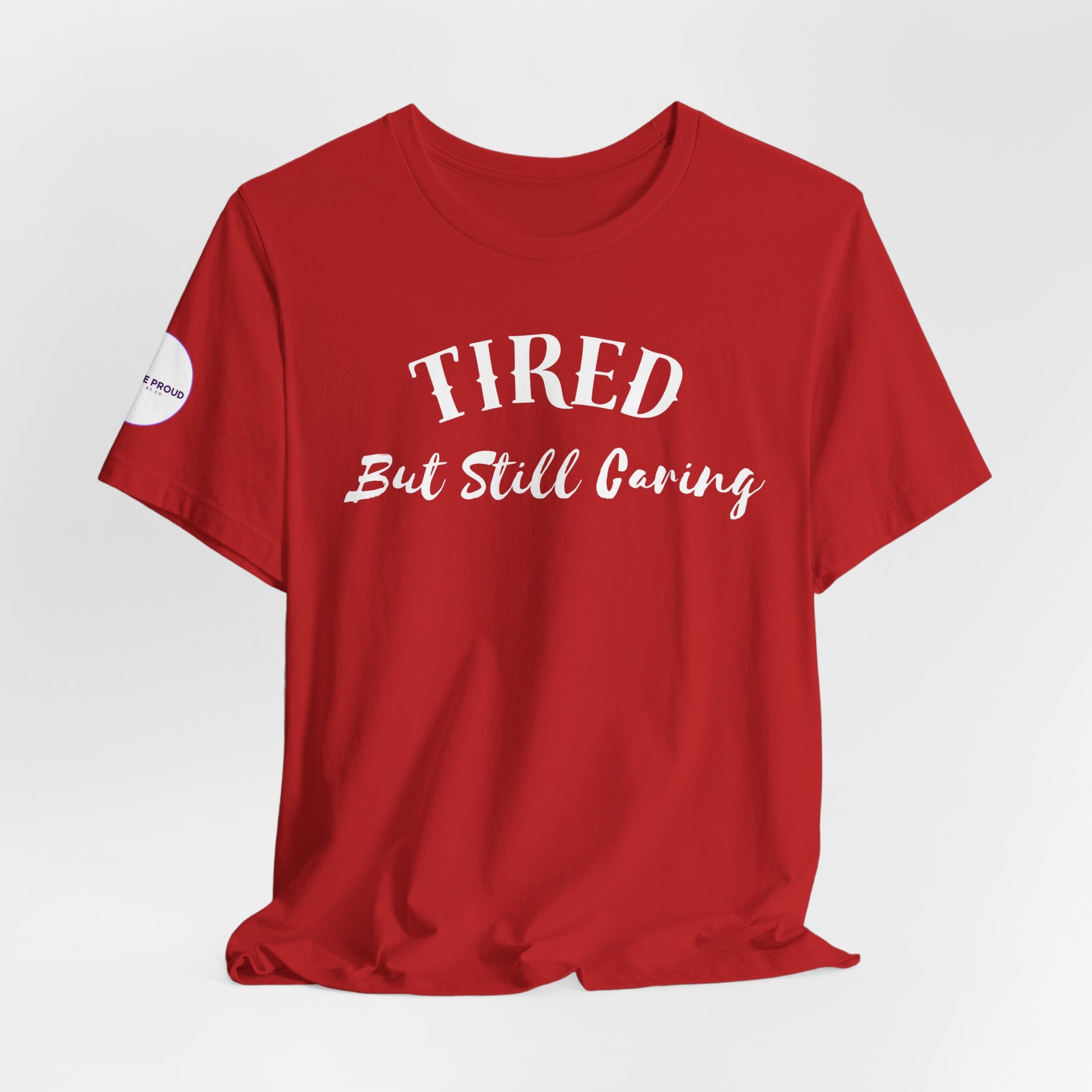 Tired But Still Caring T-Shirt with minimalist text design