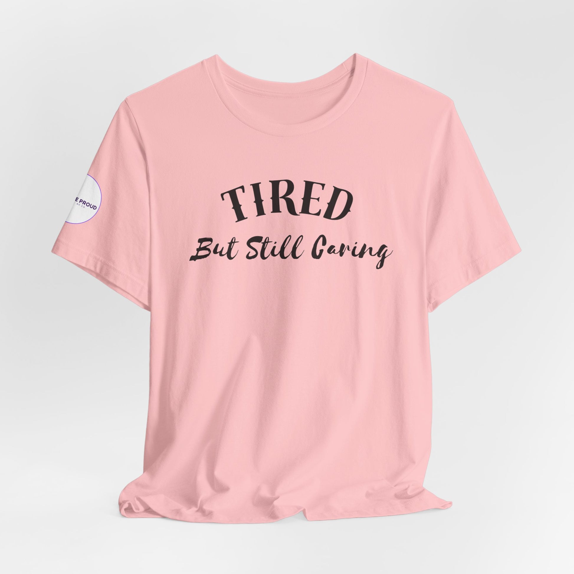 Tired But Still Caring T-Shirt with minimalist text design