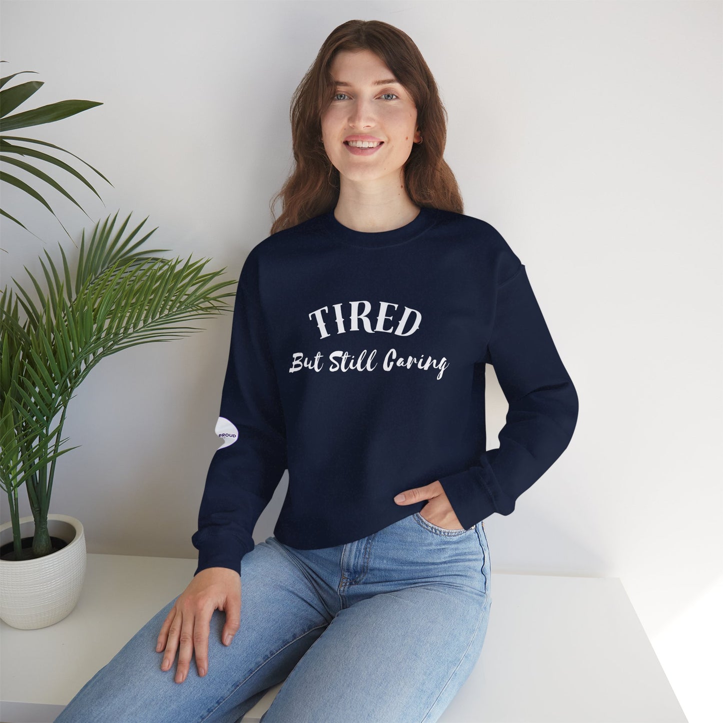 Tired But Still Caring Sweatshirt with midweight cotton-poly blend fabric