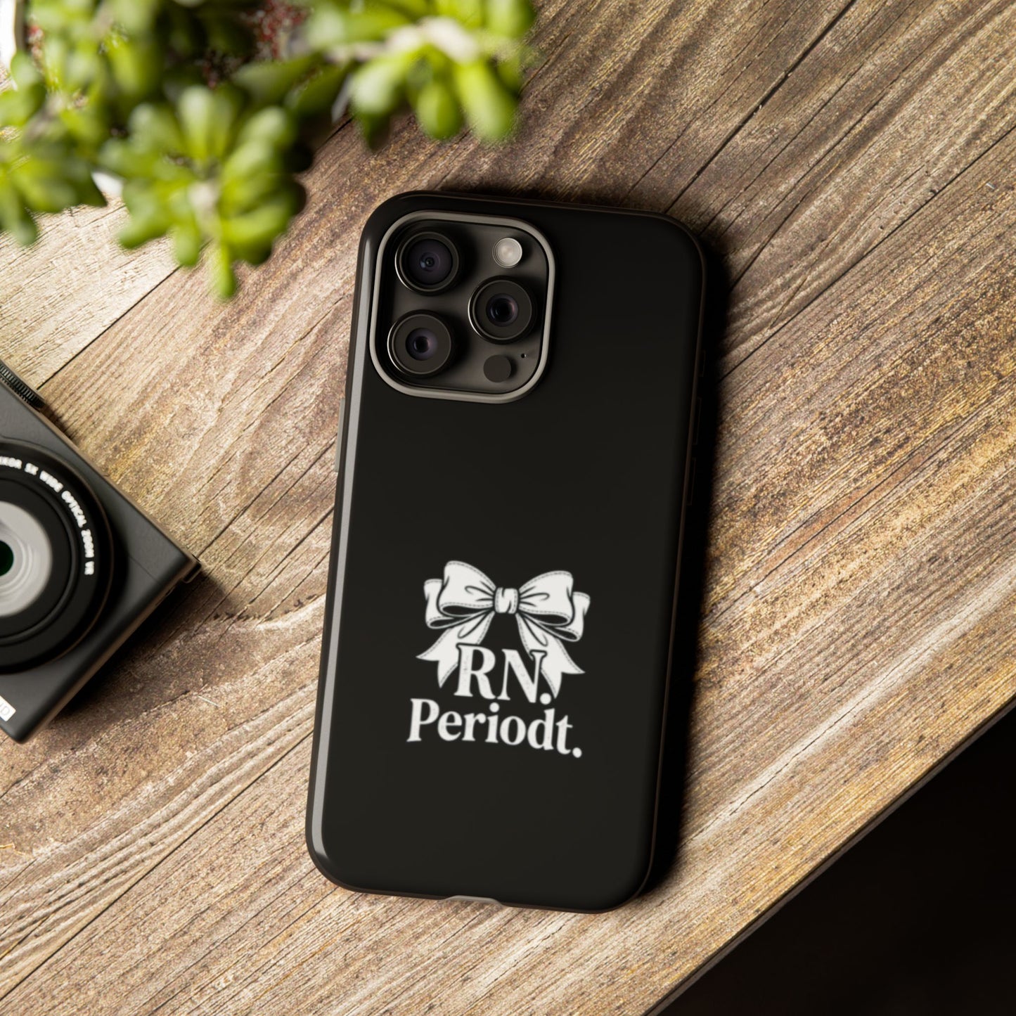 Front view of RN Phone Case with bold white bow print