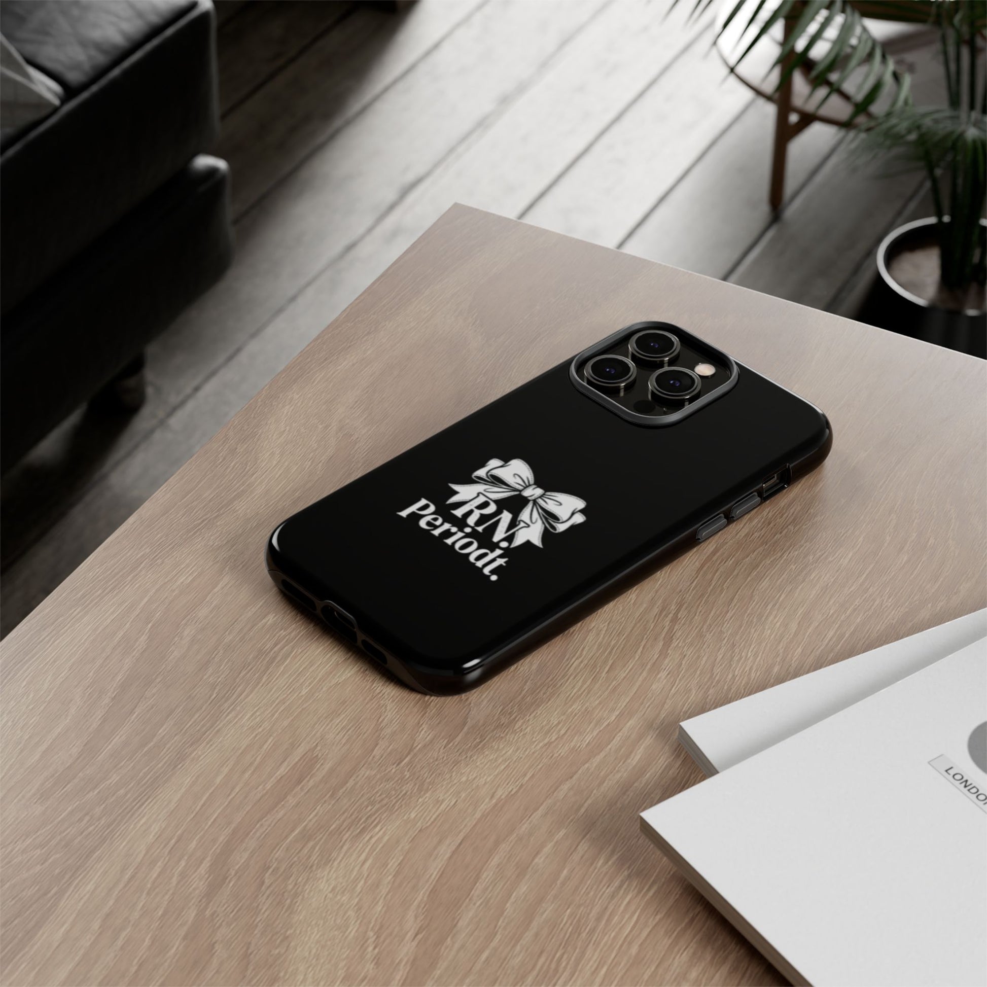 Front view of RN Phone Case with bold white bow print