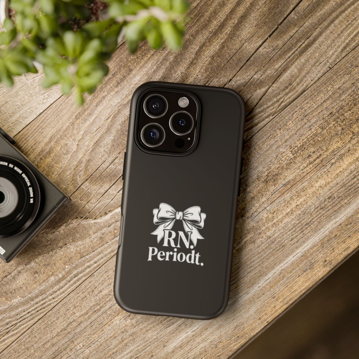Front view of RN Phone Case with bold white bow print