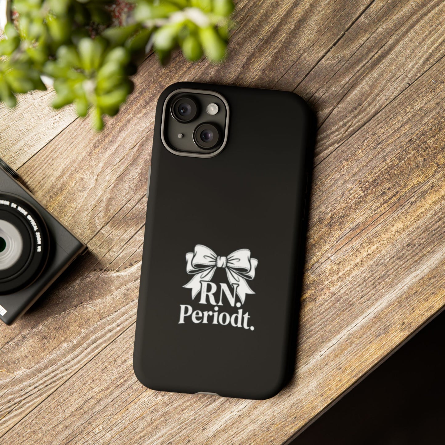 Front view of RN Phone Case with bold white bow print